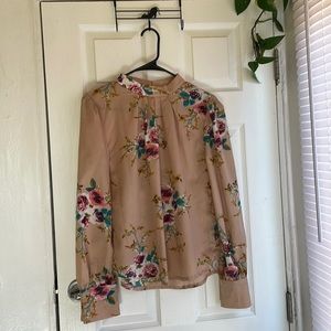 Dusty pink with pink/blue floral print blouse. Back button collar, ruffle neck